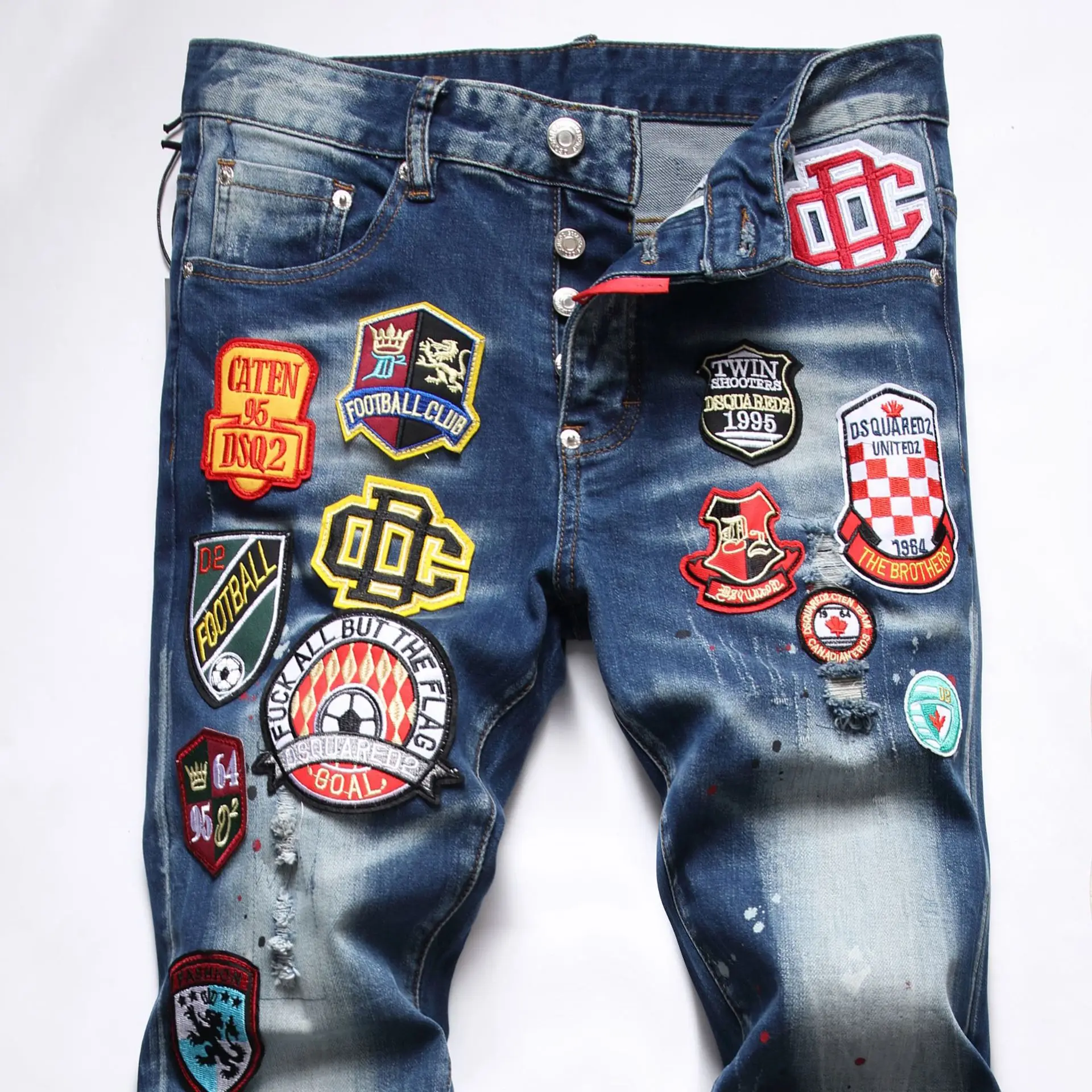 New raggedy splashy men's slim-fit ripped multi-badge stretch jeans skinny beggar chic pants