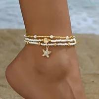 Chaîne de cheville en perles de Millet, Style bohème, coquille d'étoile de mer, ensemble de trois couches, accessoire de bijoux de pied élégant et de plage, été 5