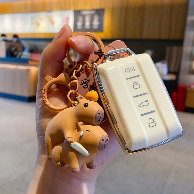 

Car Pendant, Cute and Silly Water Dolphin Keychain, Internet Famous Capibala Creative Doll Keychain, Car Pendant