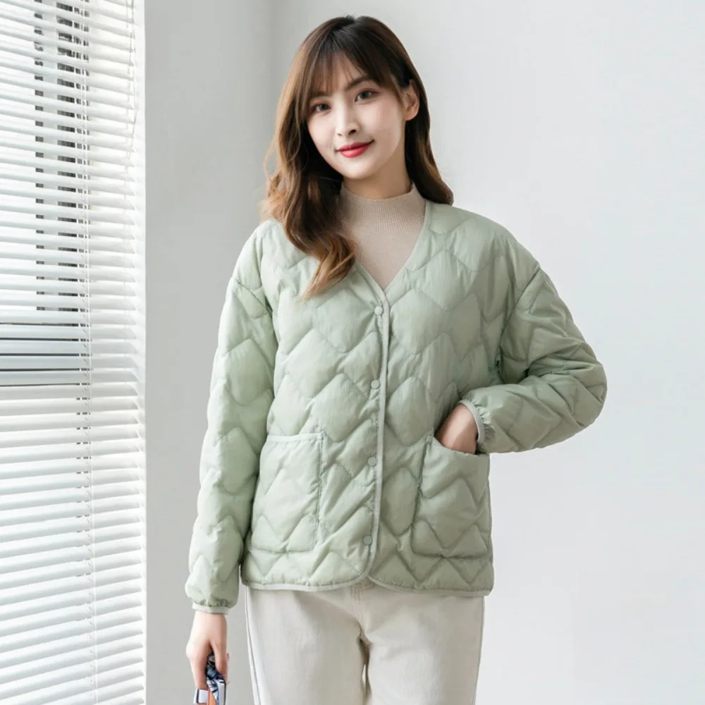 Рисунок 4 - Женский пуховик в клетку со стразами