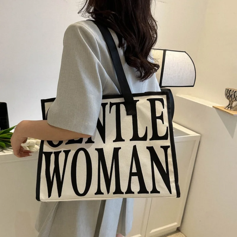 Single Shoulder Canvas Bag Women's New Fashion Outgoing Handheld Shopping Bag Large Capacity Commuting Tote Bag