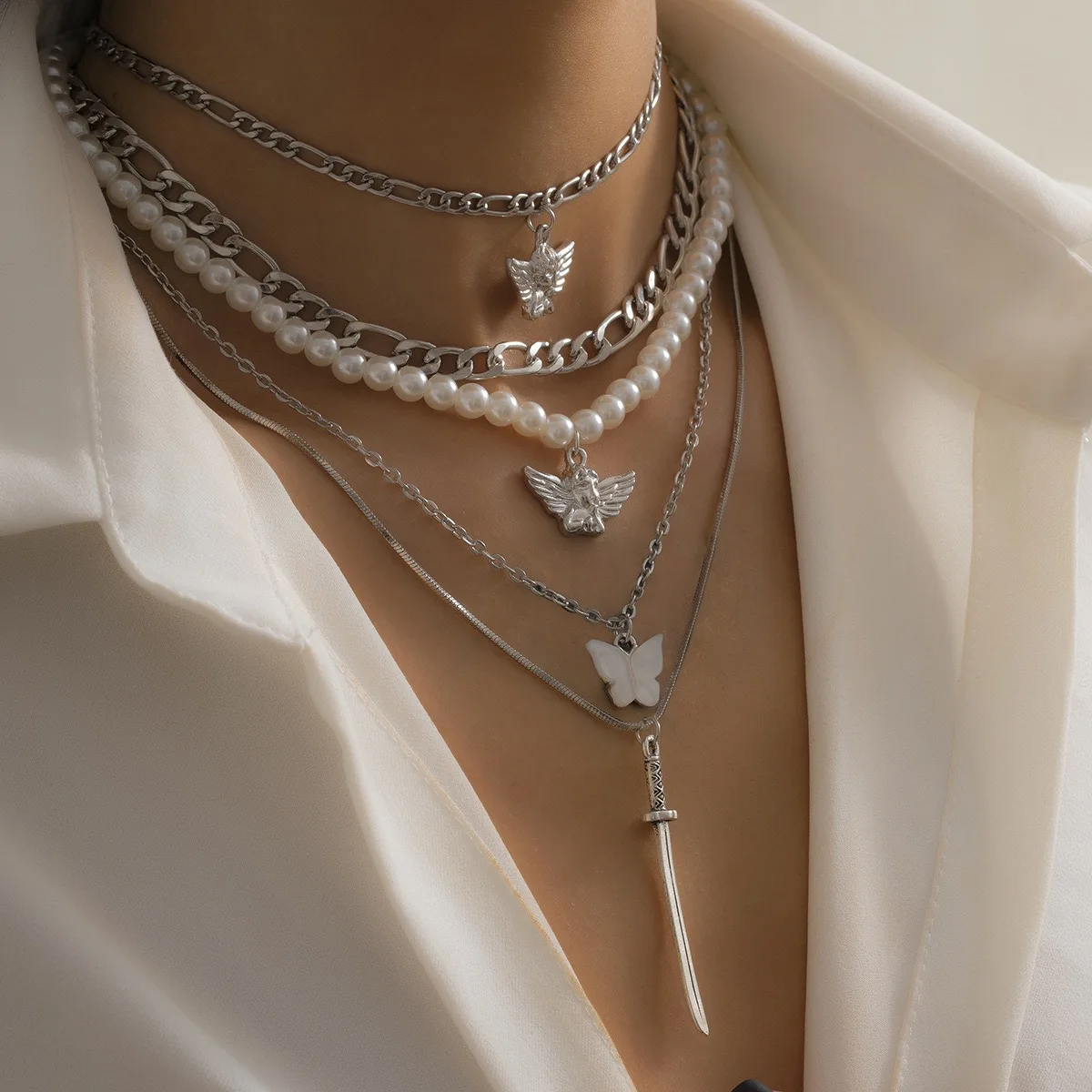 

2023New 5 piece Set Of imitation Pearl Chain Pendant Angel Butterfly Sword Multilayer Necklace Punk Jewelry Party Gift Wholesale