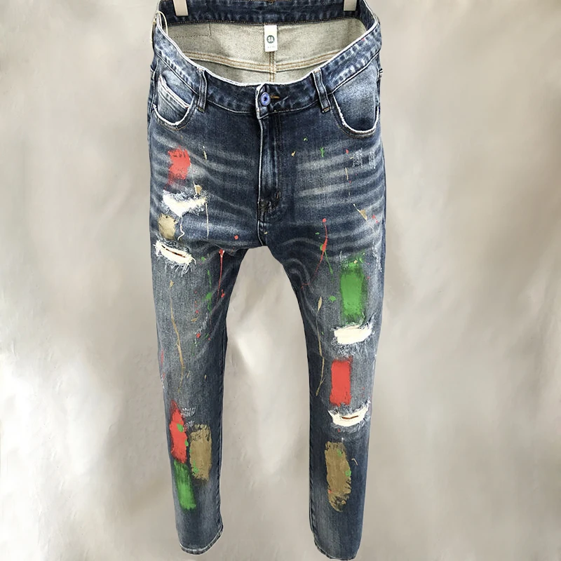 

Color Contrast Paint Inkjet Broken Patch Trouser For Men Ripped Hole Design Beggar Men Pantalon Jeans Hip Hop Vaqueros Hombre