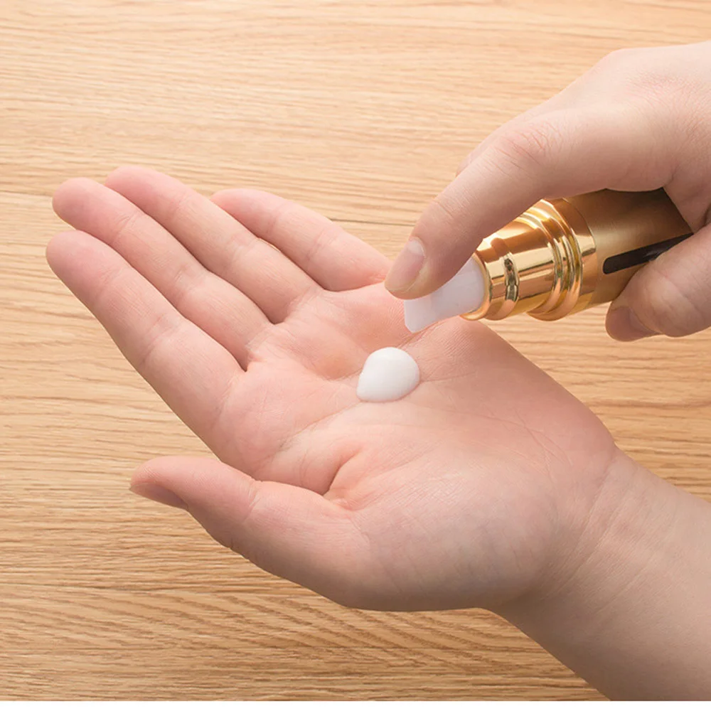 30ml&50ml capacity gold color round shape acrylic material alumite Vacuum lotion bottle with duckbilled pump and cap 3