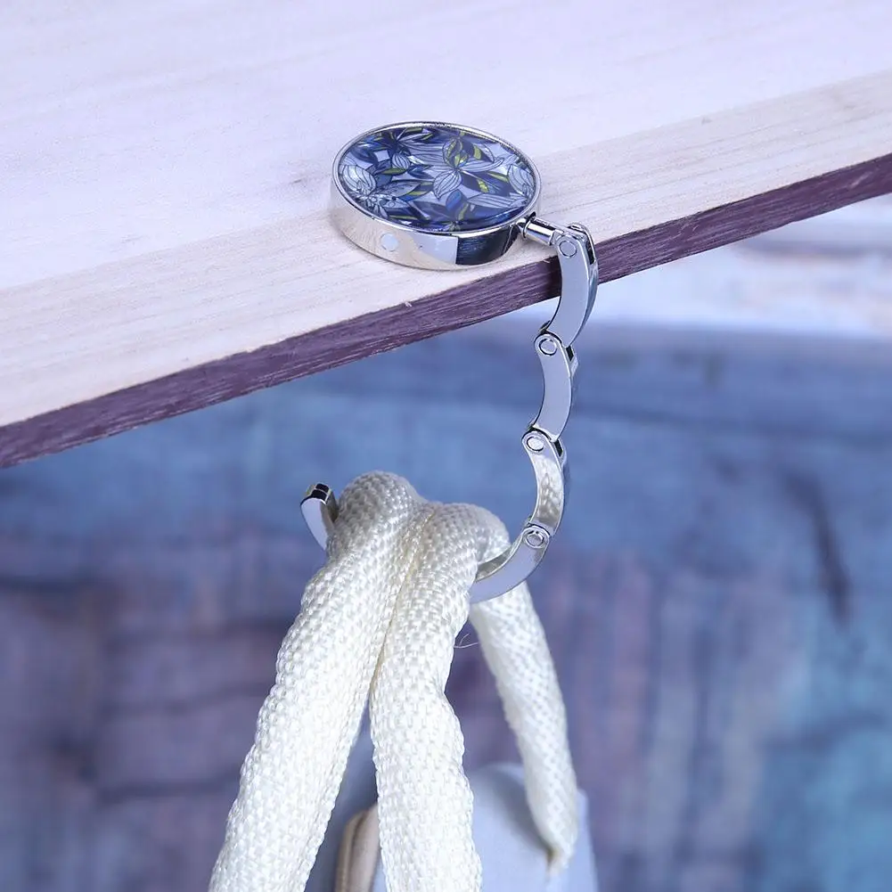 

Металлическая сумочка, держатель, сумка-ракушка, портативная складная сумочка, держатель для стола, круглые миниатюрные чистые подарки для отелей, ресторанов