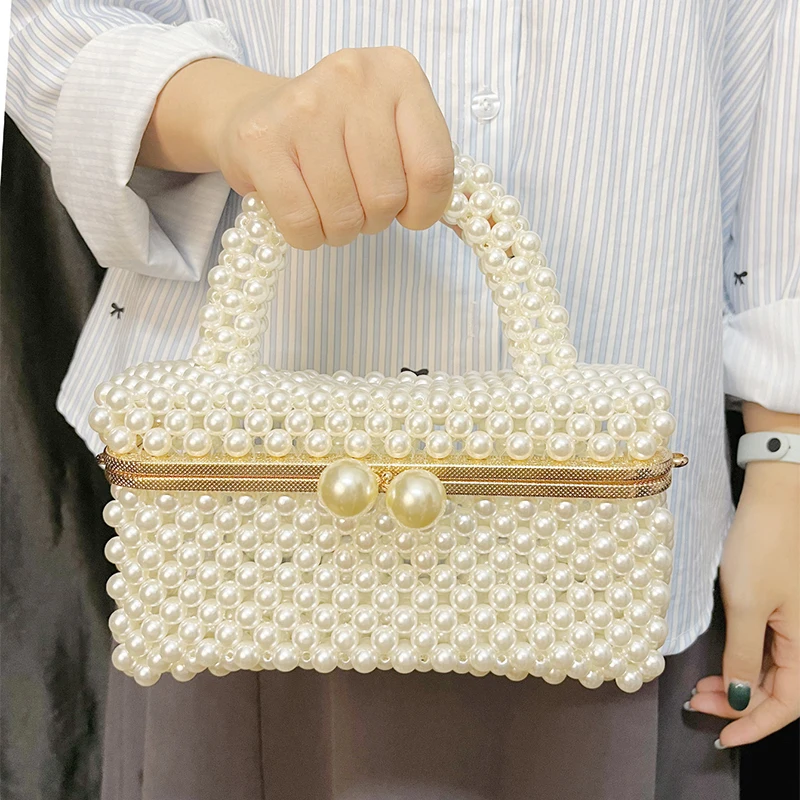 Imitation pearl woven hollow small square bag 2025 summer new handbag elegant solid color bead women's handbag