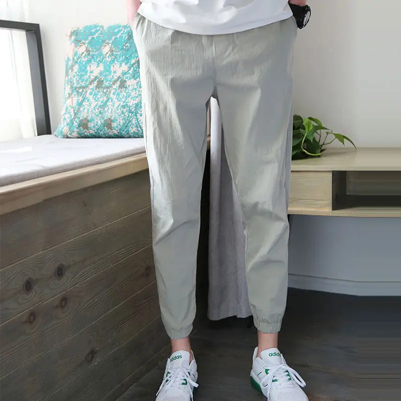 

Summer Ice Silk Casual Pants Men's Nine-point Pants Beam Feet Korean Version Loose Trend Youth Student Thin Sports Pants