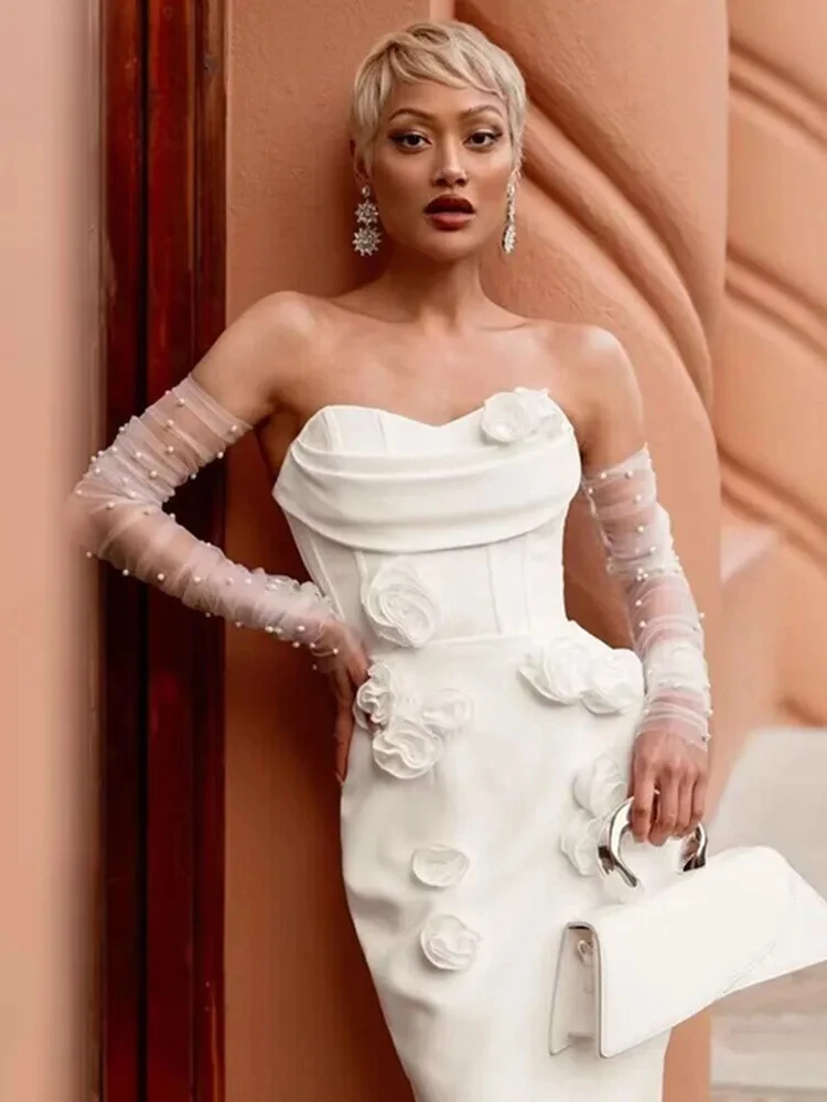 sachin and babi light blue dress From Diana To Rihanna: 24 Unforgettable White Dresses main image 1