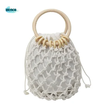 Borsa a secchiello in paglia intrecciata fatta a mano stile coreano, design di nicchia, elegante borsa da spiaggia per esterni
