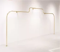 Wall mounted hanging clothes pole on the display rack