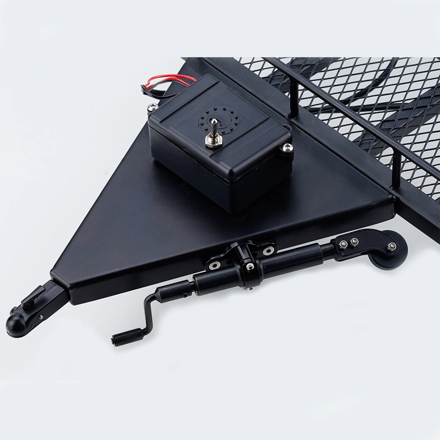 Détail du châssis acier de la remorque tubulaire pour crawler RC 1/10 avec attache de roue jockey