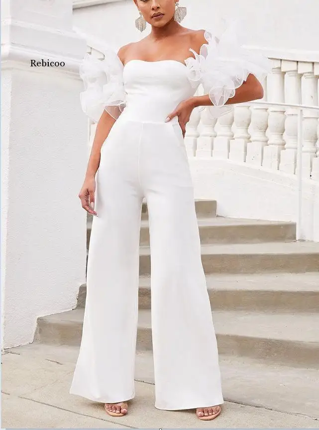 

Комбинезон женский летний с открытой спиной, пикантные длинные брюки с широкими штанинами, без рукавов, повседневный ромпер с карманами, на бретелях с оборками, белый черный