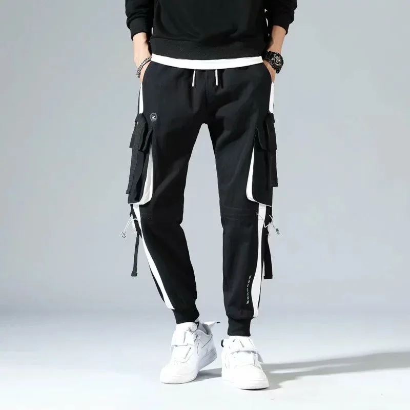 

The new style country tide overalls man splicing rope binding pants ins loose hip-hop fashion casual pants man