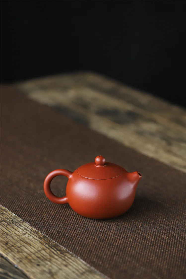 Description Picture 4 of item240ML Yixing Purple Clay Teapot Machine-made Xishi Tea Pot Raw Ore Dahongpao Quality Teaware Oolong Pu're Tea Set Filter Kettle