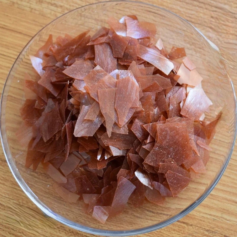 thumbnail image 1 of Lámina de pintura de resina de goma laca india de 50 g, protección del medio ambiente, resistente al agua, artesanías de madera, material de decoración de superficies, 1 of 5