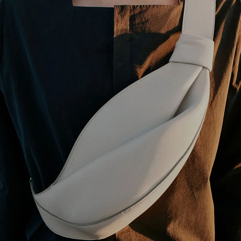 2025 New Fashionable Horn Bag large capacity pillow shaped personalized niche travel smooth cowhide crossbody bag 4