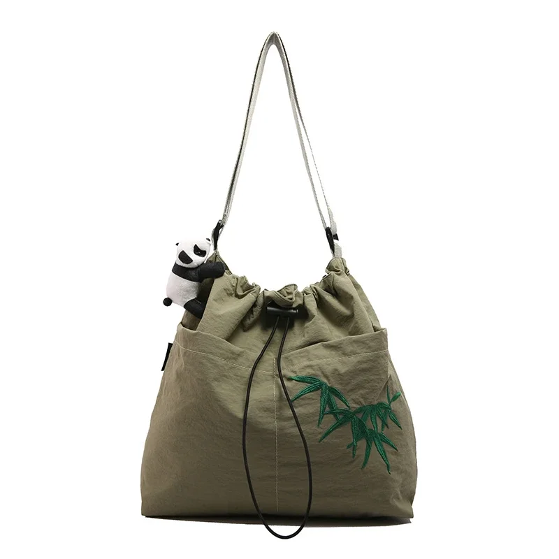 thumbnail image 1 of Nuevos bolsos cruzados de nailon de gran capacidad con cordón y bordados, tendencia de venta caliente 2024, bolsos de mano versátiles, bolsos de hombro para viajes diarios, 1 of 5