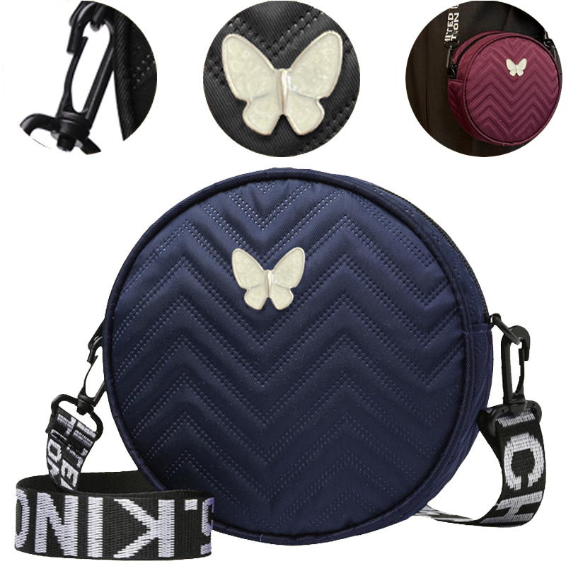 Round design crossbody single-shoulder handbag for shopping, available in black, white, purple and blue, suitable for ladies.