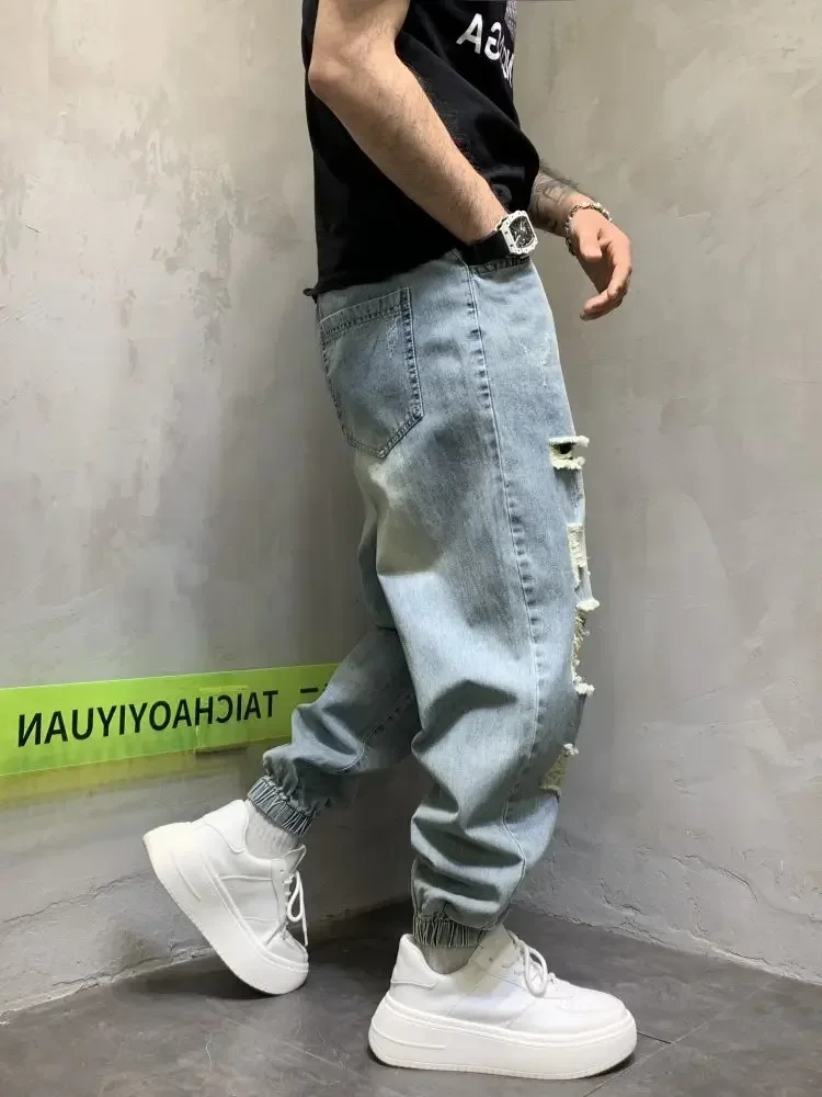 Pantaloni da Cowboy maschili Jeans strappati da uomo con fori