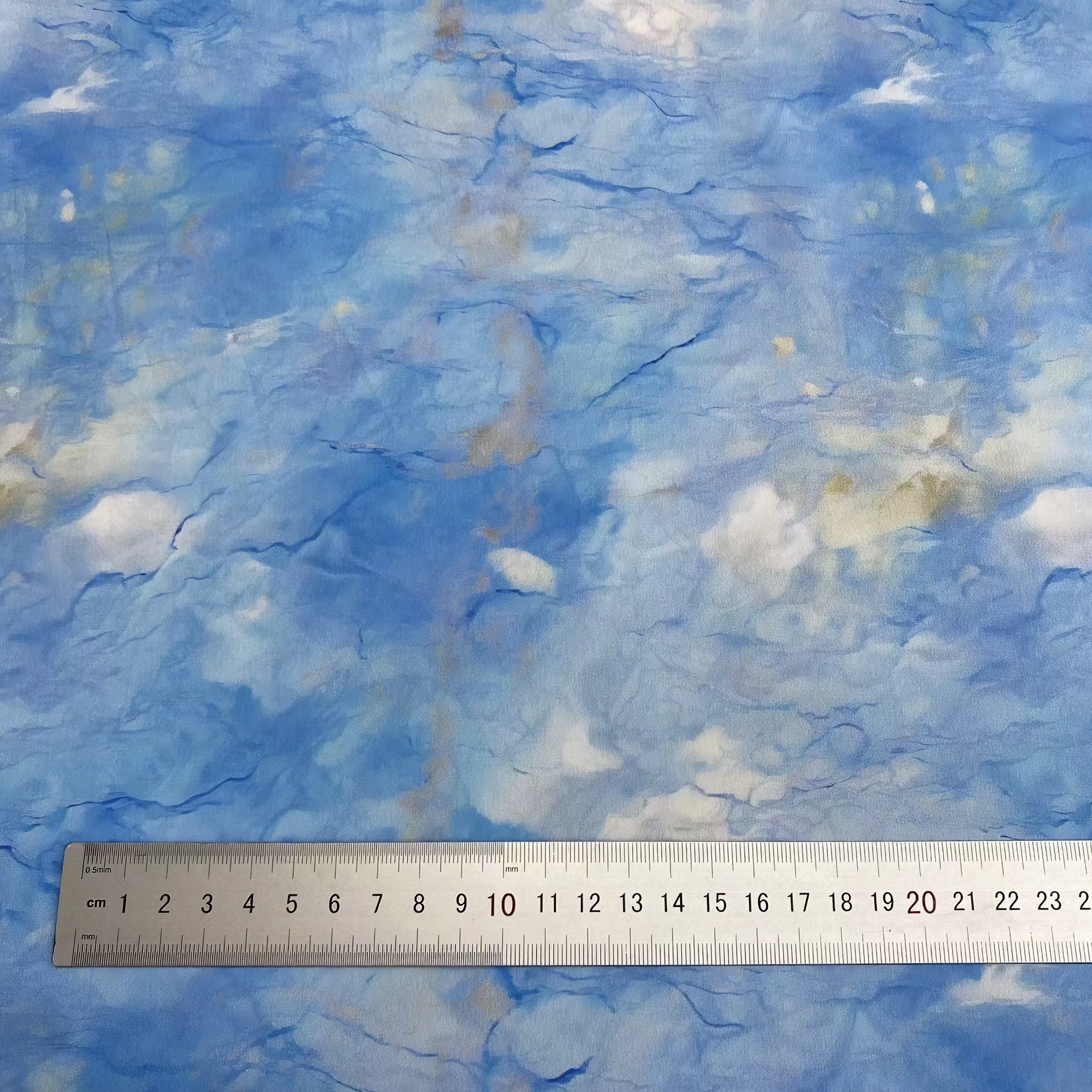 Dreamy Sky themed Blue Cotton Fabric Cloud Patterns and Watercolor like Cracks for DIY Apparel and Soft Home Accessories