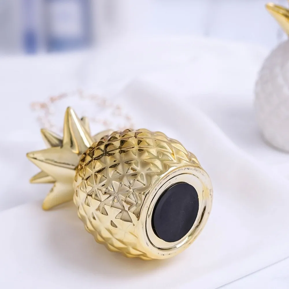 Tirelire ananas en céramique dorée objet décoratif et épargne_voghion.com