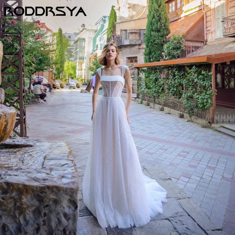 

RODDRSYA Exquisite Lace A-Line Wedding Dress Square Neck Wide Straps Floor Length Bridal Party Illusion Button Back Brautkleid