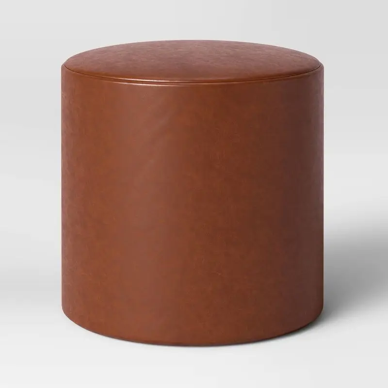 

Round Upholstered Ottoman in Caramel Faux Leather, Classic and Versatile Addition to Home Decor