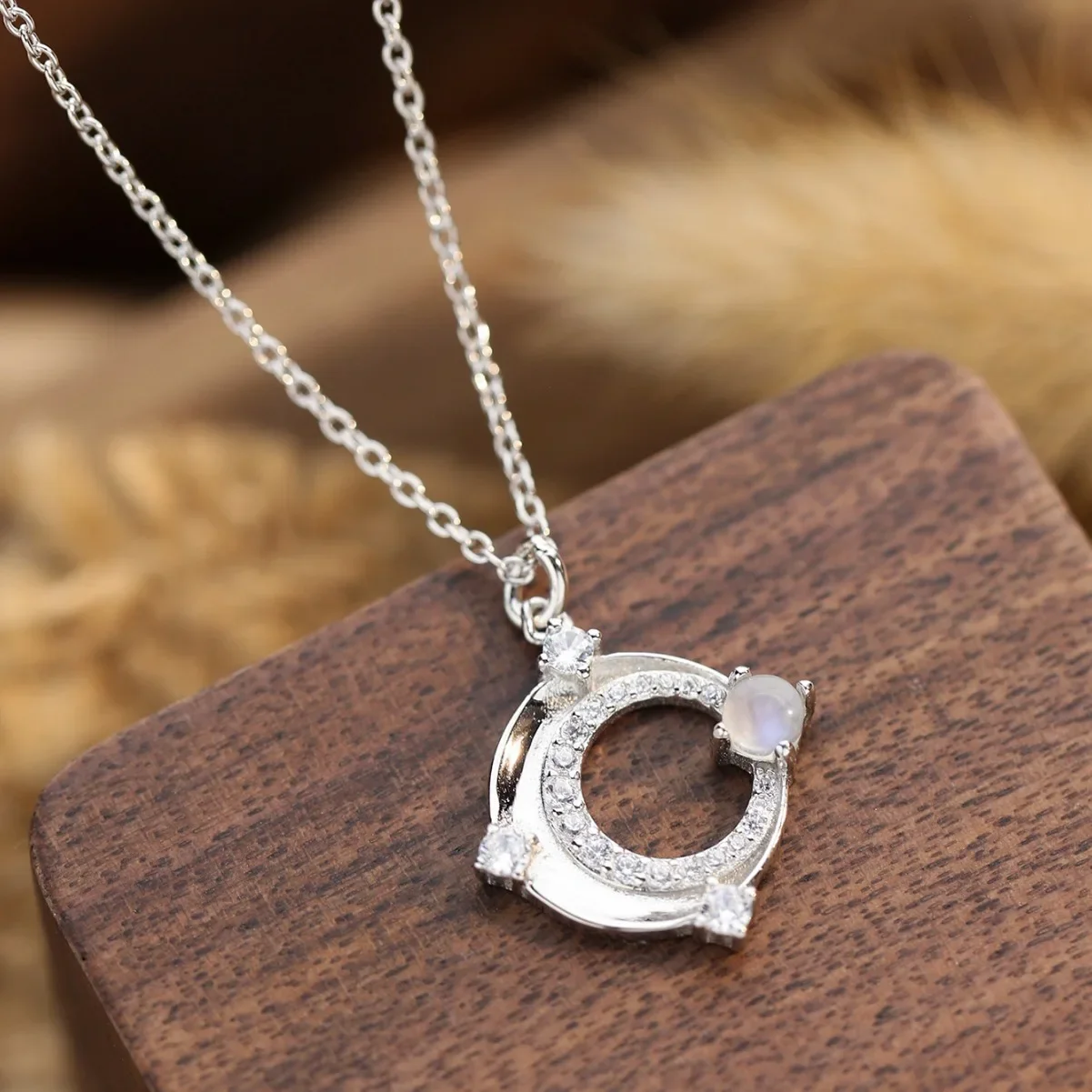 

Hot Selling S925 Sterling Silver O-shaped Hollowed Out Moonlight Stone Pendant Necklace Female Niche Design Fashionable Jewelry