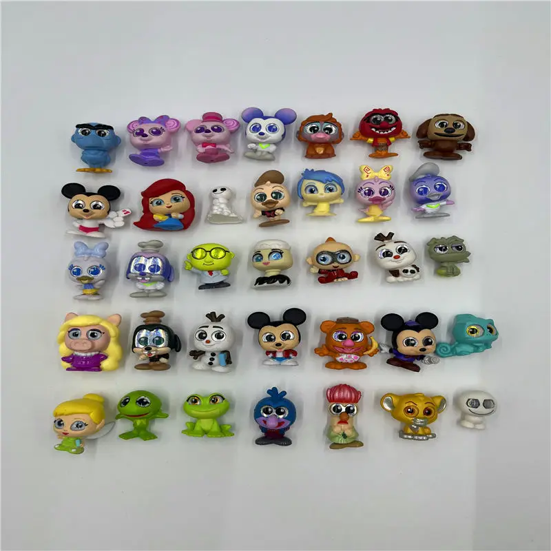 

Anime Figures Disney Doorables Snow White Mickey Minnie Princess Elsa Kawaii Big Eyed Doll Collect Cartoon Model Toys Kids Gifts