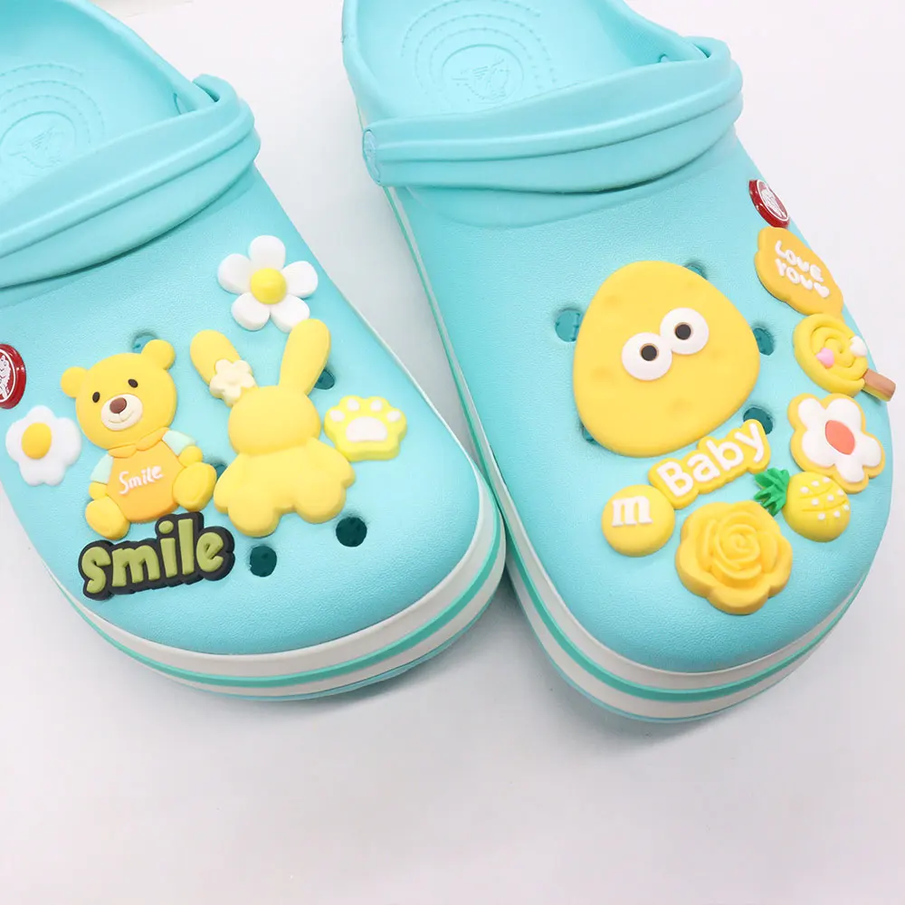 

Mix 50PCS PVC Shoe Charm Yellow Pineapple Smile Bear Baby Footprint Egg Rabbit Flower Love You Buckle Clog Decorations for Bands