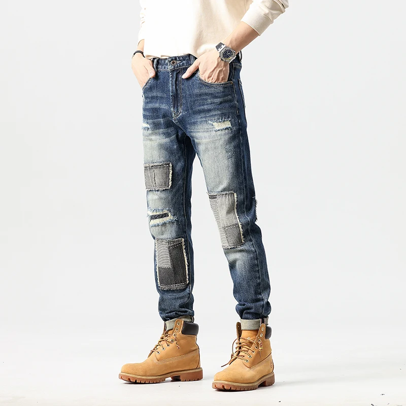 Fashionable irregular splicing design jeans men's slim fit small straight leg elastic American trendy pants denim cargo jeans
