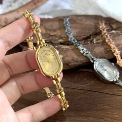 Ladies Vintage Luxury Quartz Watch with Elongated Alloy Bracelet (Gold)
