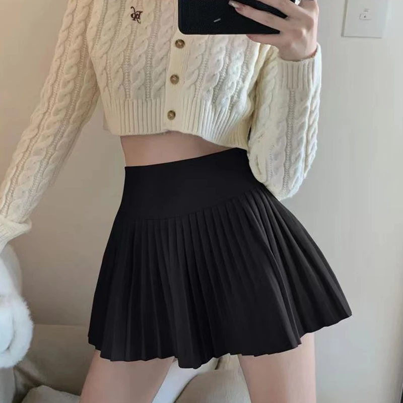 thumbnail image 1 of Falda plisada blanca elegante Rimcoy 2024 para mujer, estilo preppy, cintura alta, línea A, minifalda de verano de color liso para mujer, 1 of 5