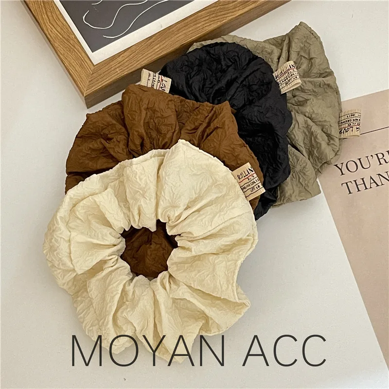 

Korean version of the hair rope simple solid color bubble texture large intestine hair ring new temperament balls scalp tendons