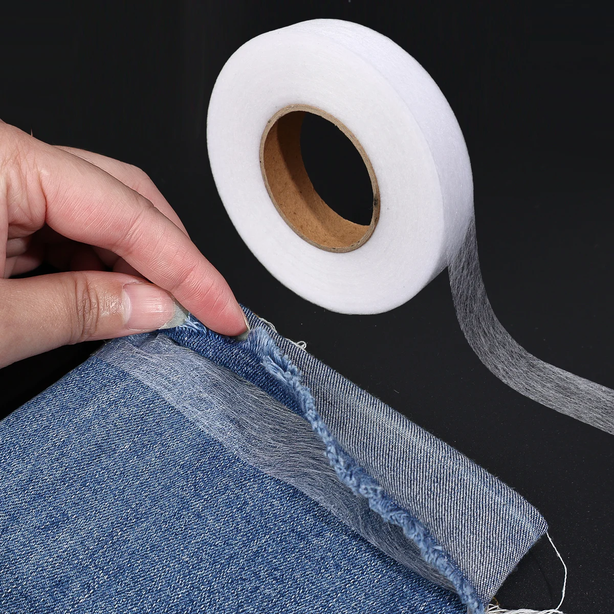 Description Picture 6 of item60M Double-sided Non-woven Interlining Adhesive Tape Iron On Hem Tape Edge Shorten Repair Pants For Hats Clothes DIY Sewing Tool