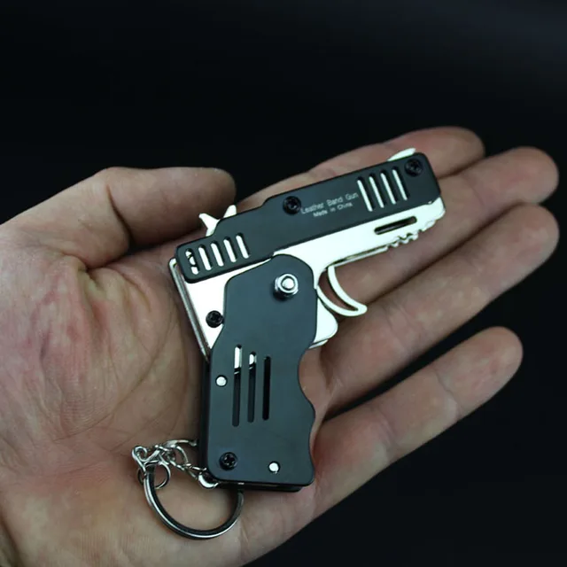 All metal mini can be folded as a key ring rubber band gun children's gift toy six bursts of rubber toy pistol  toy gun 1