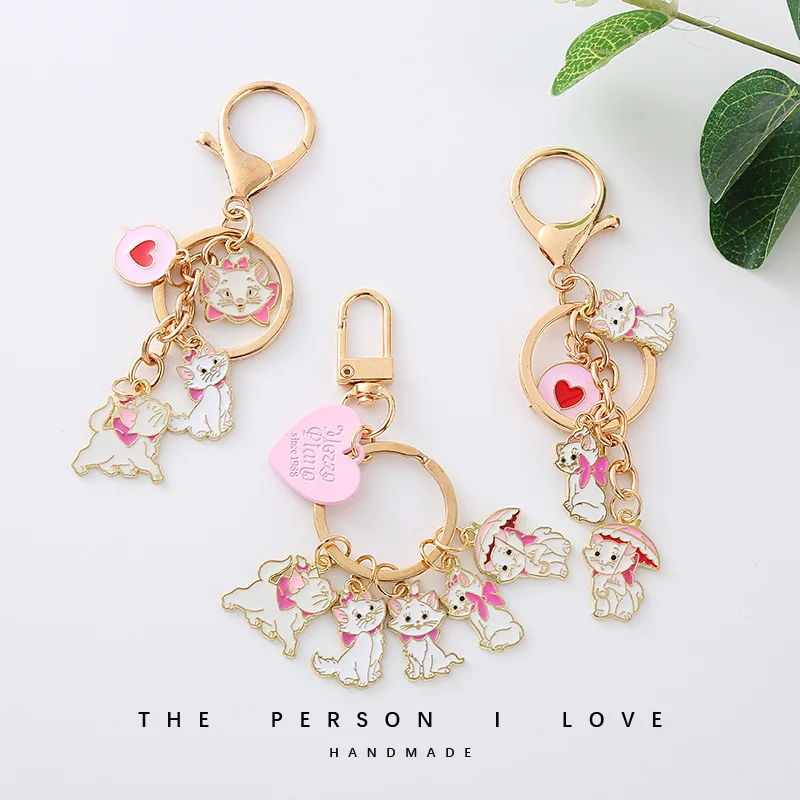 

Cute Cartoon Cat Keychain, Metal Heart Tag, Keyring, Women's Headphone Case, Pendant, Backpack, Charm Best Gifts
