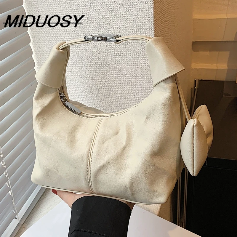 

French Minority Simple Bag Women's 2023 New Popular Hand Carrying Dumpling Bag All-Match Internet Hot Casual Shoulder Bag