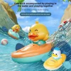 1pcs Baby Water Play Toys Kayak Baby Yellow Duck Rowing Boat Bathing Girls Children Bathroom Wind Up Beach Pull Line bath toys 1