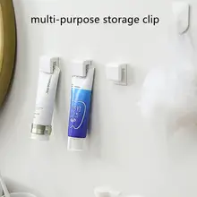 Não-marcação banheiro pendurado clipe multi-purpose creme dental cleanser cremalheira de armazenamento de pasta de dentes de plástico clipe de creme dental titular