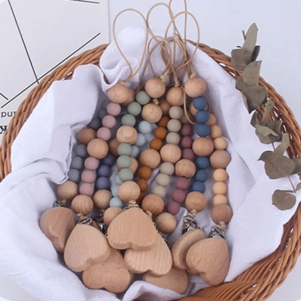 

Anti-drop Beads Food Grade Beech Wood Star Clip Wooden Baby Pacifier Chain Molar Chain Pacifier Clips Chains Nipple Holder