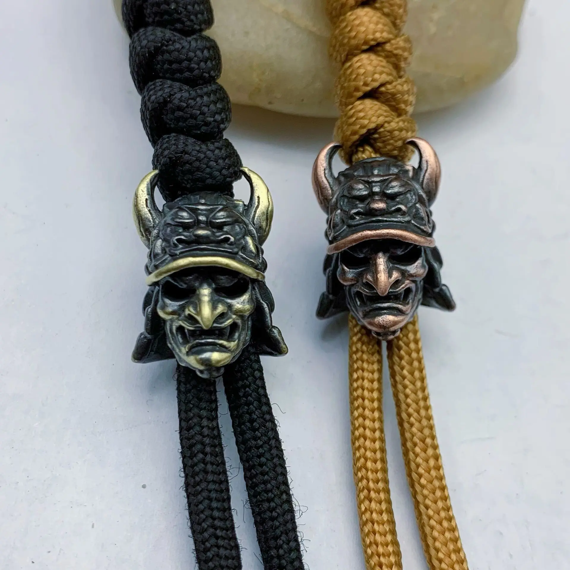 

XM-funny Brass spiked tooth skull samurai sword pendant Outdoor EDC tool charm DIY bracelet pendant Umbrella rope pendant