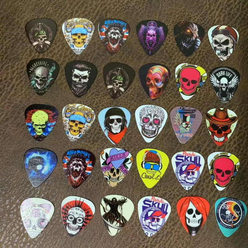 

10pcs Newest The cartoon skeleton Guitar Picks Thickness 1.0mm guitar pick ukulele for Guitar Accessories