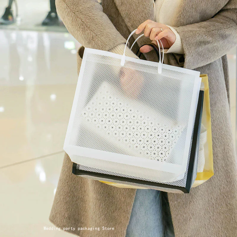 

10pcs/lot Transparent mesh clothing store bag high-end women's clothing tote bag pvc simple gift shopping bag