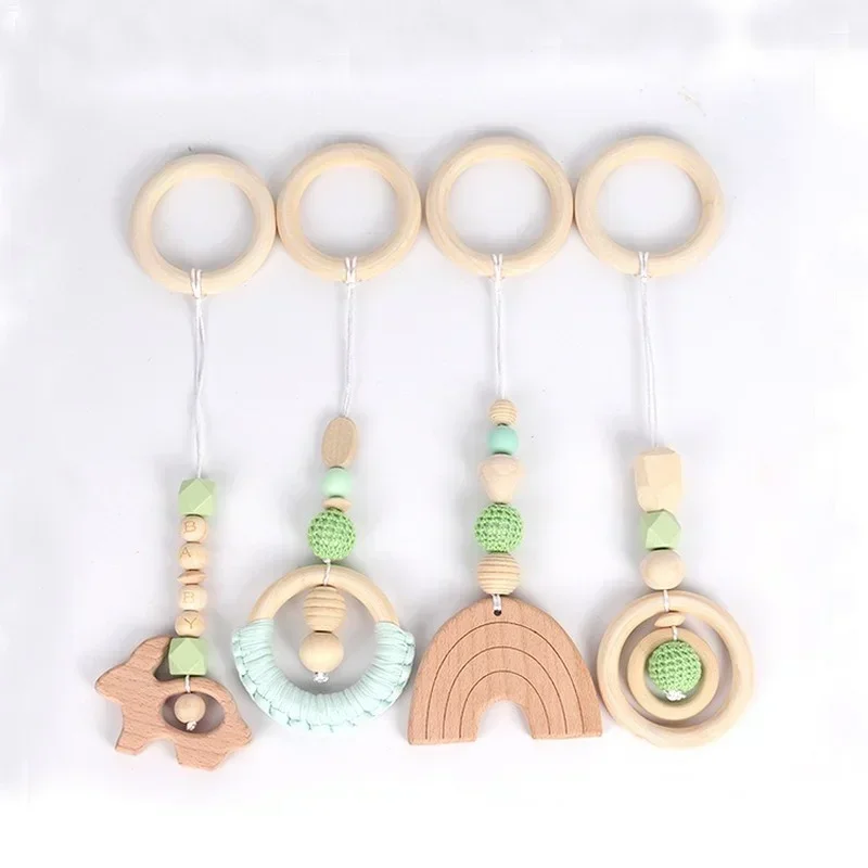 4PCS/Set Wood Teether Toddler Hanger Rattle Wood Ring Teething Toys For Newborn Baby Pram Toy Bebe Baby Play Gym Silicone Beads