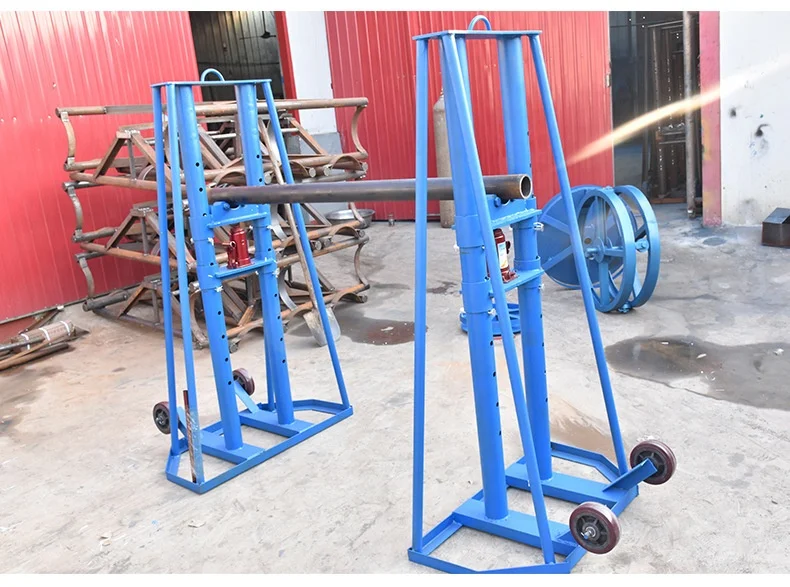 https://ae01.alicdn.com/kf/Se677e8e1c55b4d1d9686d40a8455ffaaa/Cable-Reel-Stand-Drum-Support-Wire-Rope-Jack-for-Pulling-and-Laying-Releasing-for-Construction.jpg