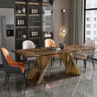 Table à manger en marbre avec structure en métal doré, mobilier élégant pour salle à manger et chambre d'hôtes. 4