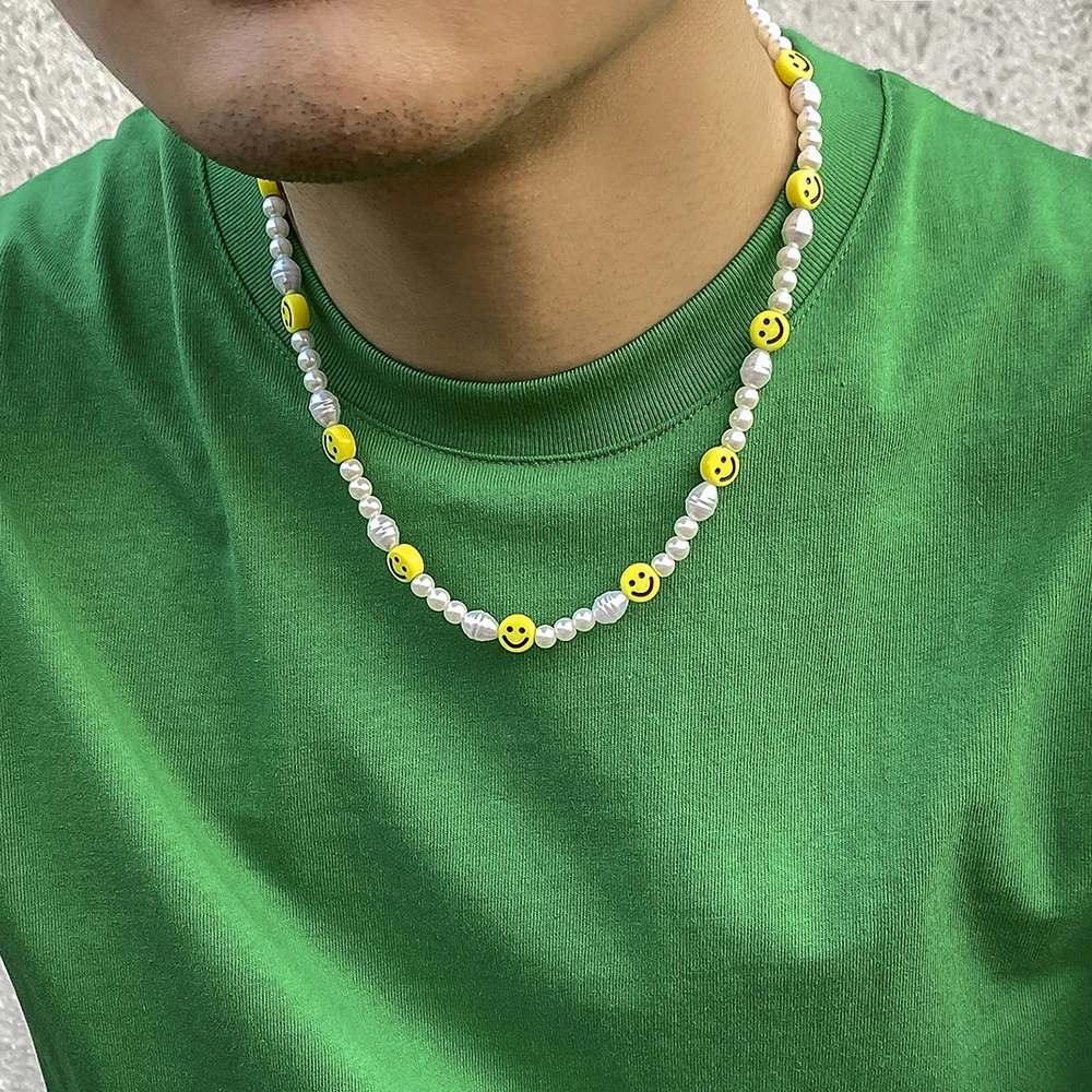 Set di gioielli con volto sorridente di perle - Vista laterale