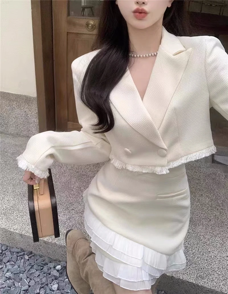 Conjunto de falda de dos piezas de lujo para mujer, chaqueta corta con solapa y volantes, minifalda ajustada de retazos, moda coreana, otoño