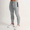 2024 cross-border spring and summer new solid color fitness trousers casual elastic men 4